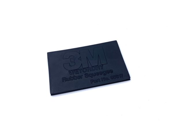 A black rubber stamp with 3 m written on it.