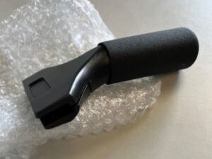 A black handle on a plastic bag