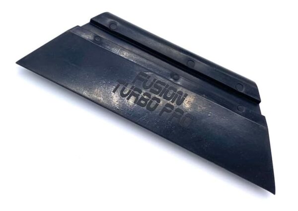 A black plastic blade with the words fusion turbo pro written on it.