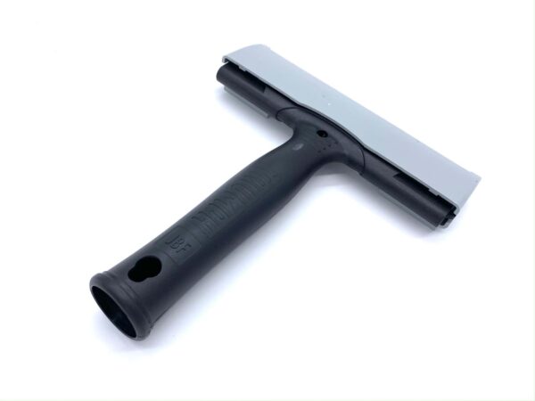 A black handle with a metal blade on top of it.